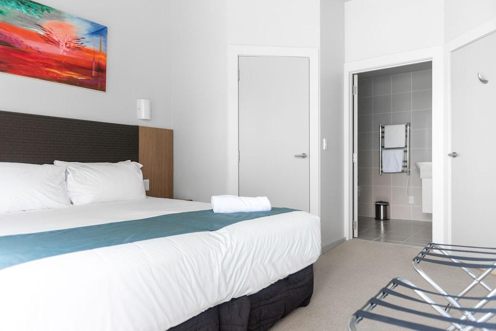 Vr Takapuna Auckland Exterior foto A bedroom at the Mantra on Lake